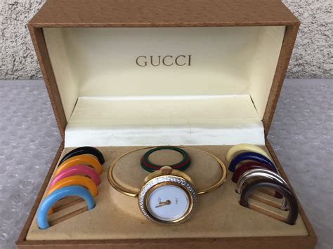 gucci bangle watch with bezels.